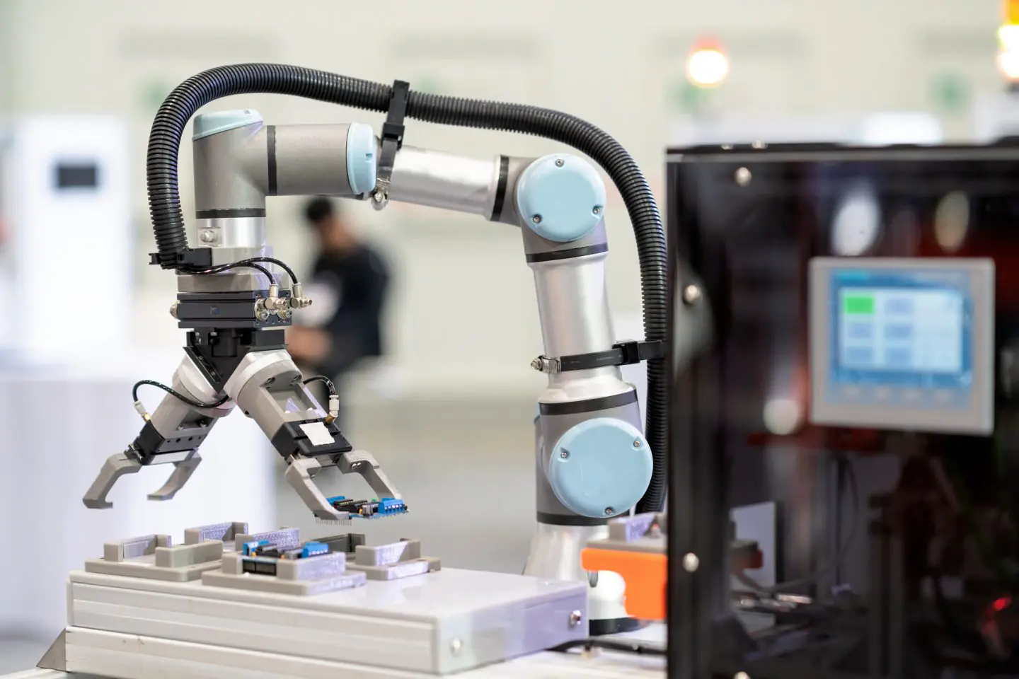 Factory 4.0 Concept : View Of Gripper On Universal Robot Is Moving  With Transfer IC Board On Automatic Conveyor In Smart Laboratory.